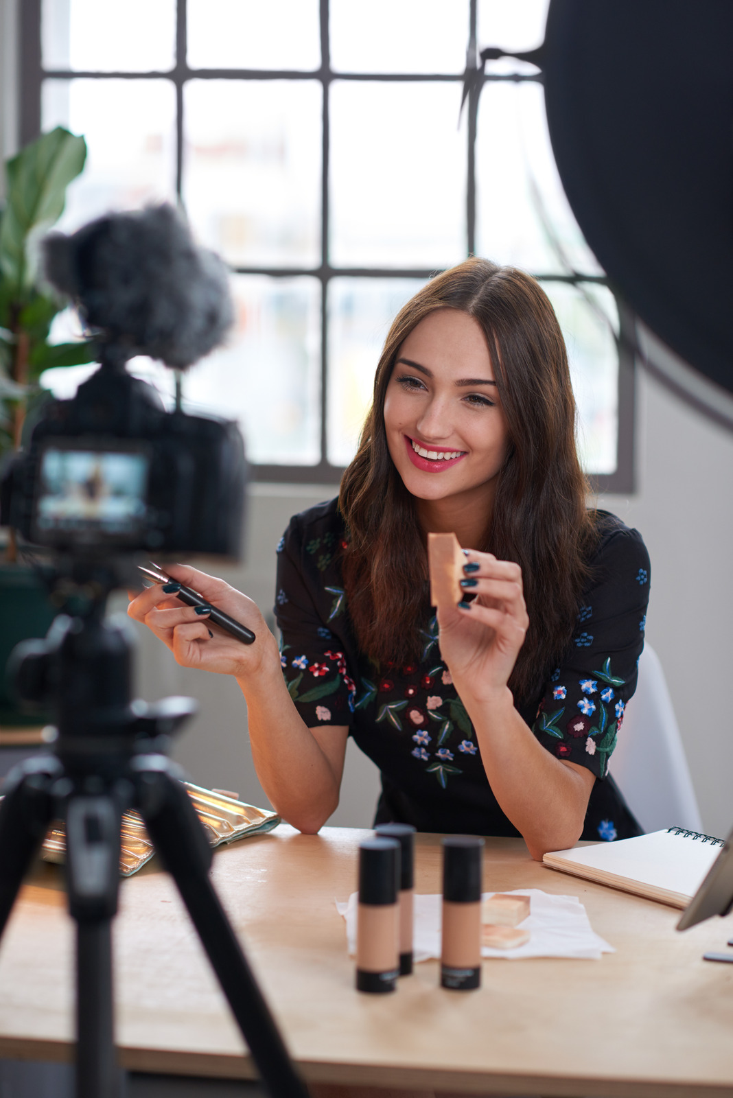 Woman in front of camera